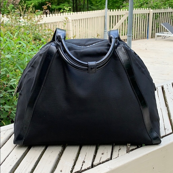 Gucci Handbags - Authentic Gucci Black Travel Bag